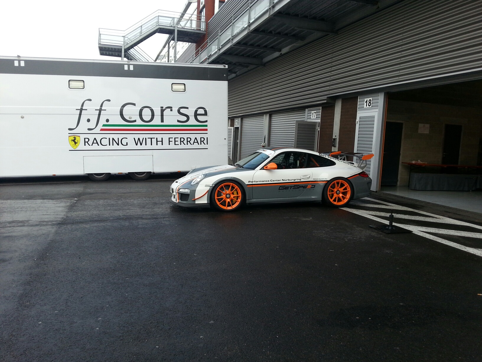 orange grey and white ferrari