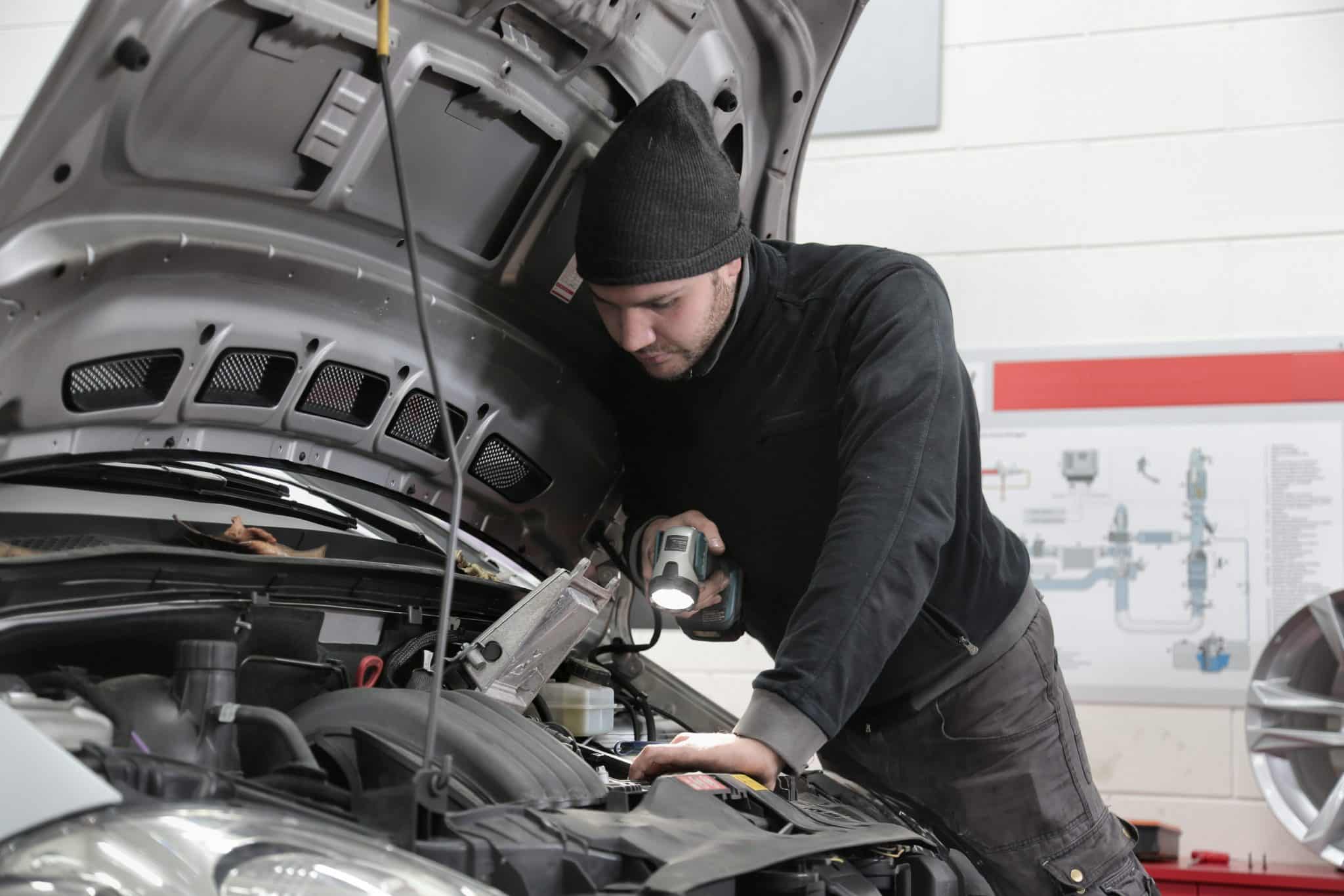 mot services - gentleman completing mot